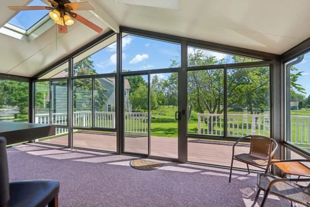Sunroom overlooking the backyard at Mount Zion Care
